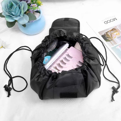 trousse à maquillage bourse noire cordon sur cotés