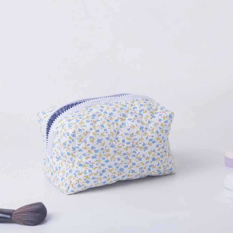 trousse a maquillage motif fleuri bleu