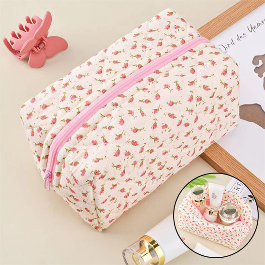 trousse a maquillage motif fleuri rose fermee