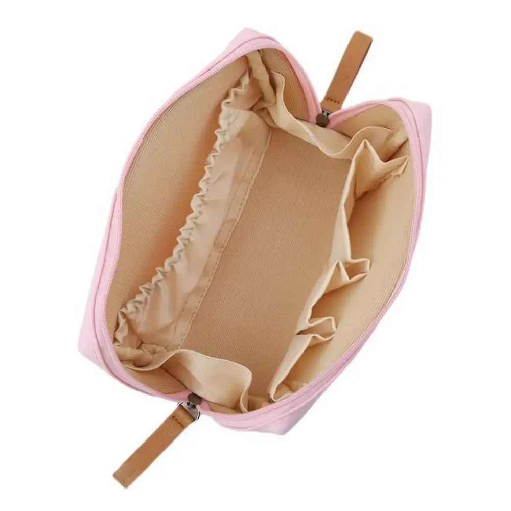 trousse de maquillage pochette rose ouverte