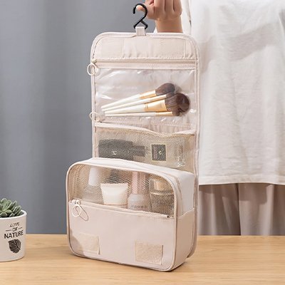 Trousse de toilette femme blanc depliee