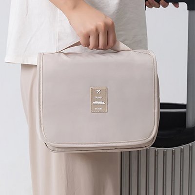 Trousse de toilette femme blanc portee main