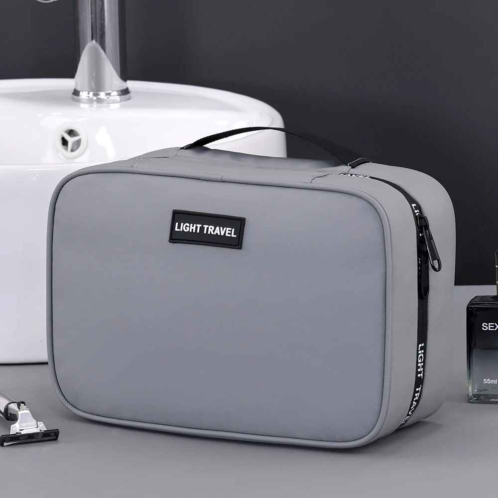 trousse de toilette homme rigide grise de biais