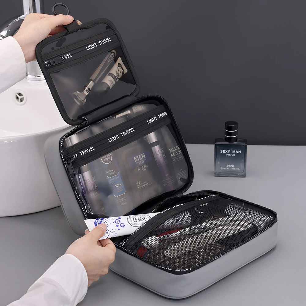 trousse de toilette homme rigide grise ouverte rangement tube de creme