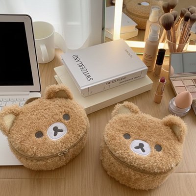 Trousse maquillage nounours 2 à coté sur bureau