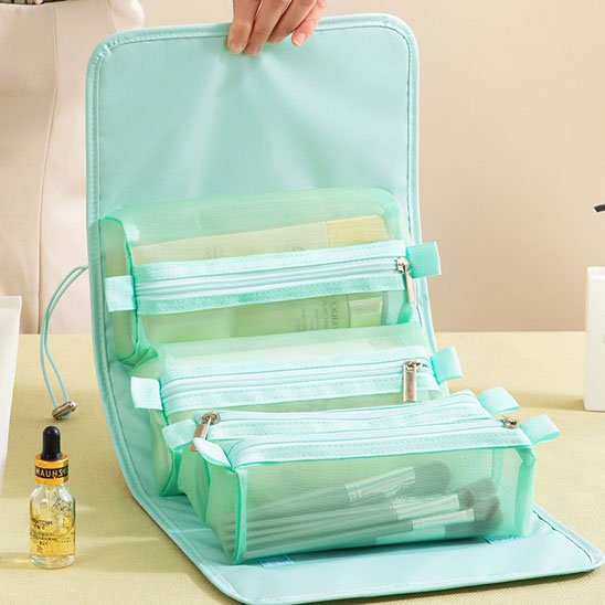 trousse pour maquillage multi-pochettes ouverte verte