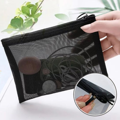 Trousses maquillage noires transparentes